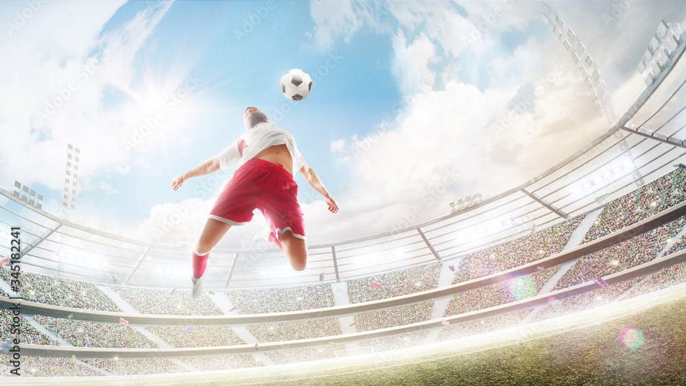Wide angle. Taking the ball on the chest in football. The soccer player is  jumping to hitting soccer ball with chest. Sport Photos | Adobe Stock