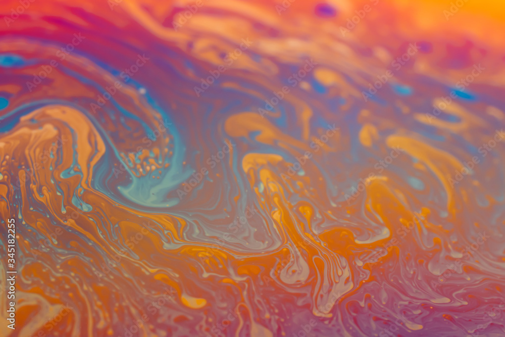 abstract background iridescent paint, in warm colors iridescent interference