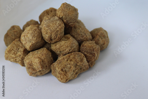 Soy meat or soya chunks close up photo