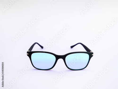 Obraz na płótnie Blue light blocking glasses. Black frame glasses for filtering blue light from the computer. Prevent Computer Vision Syndrome. Eye protection w salonie