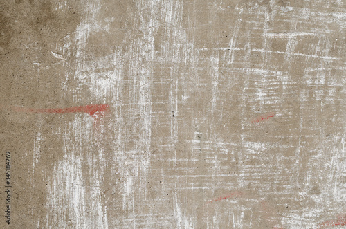 Photos old concrete wall with paint residues close up