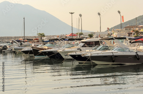 BUDVA, MONTENEGRO,AUGUST 05 ,2017: Boats anchored in the harbor. photo