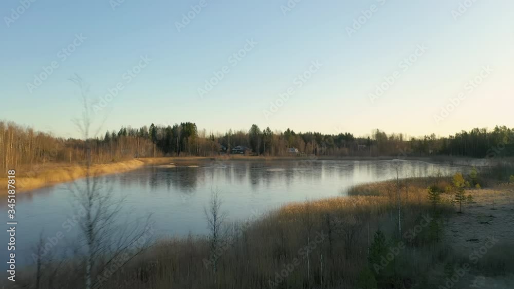 The thin ice on the water of the lake in Finland.aerial shot The thin ice on the water of the lake in Finland.aerial shot