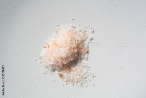 A Heap of Pink Himalayan Salt on white background
