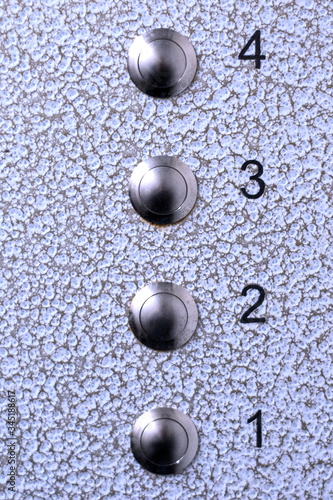 Elevator buttons with numbers close up.