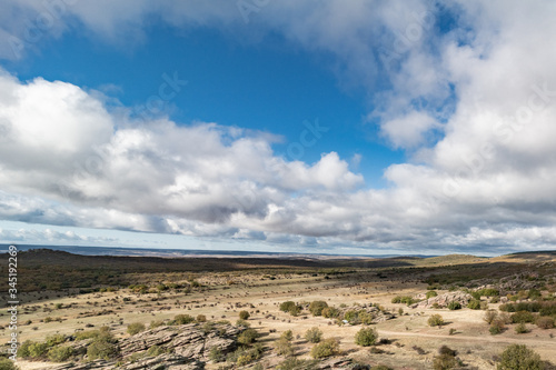 panoramic view of great plain with characteristic clouds