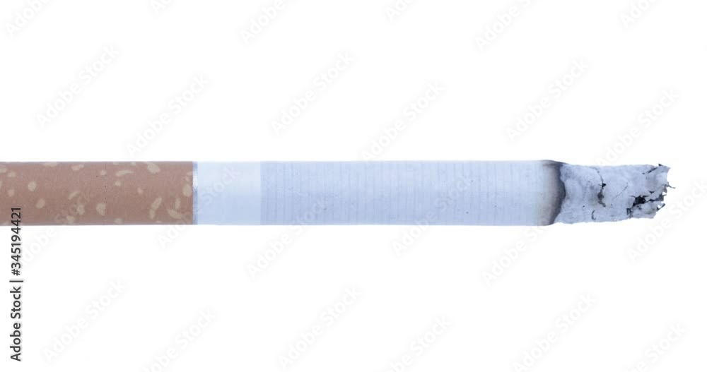 Smoldering cigarette on a white background. Smoke from a cigarette Smoldering cigarette on a white background. Smoke from a cigarette