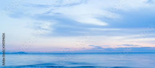 Wallpaper Mural beautiful clouds over the sea. pastels tones Torontodigital.ca