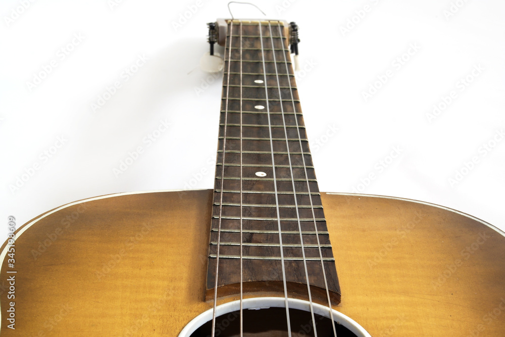 guitar without a single string on a white background guitar without a single string on a white background