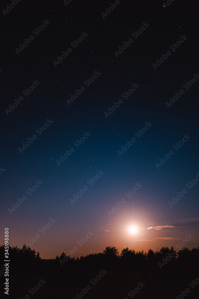 Landscape with Moon. Night sky with stars. Beautiful night sky photo taken in Ukraine during a clear night
