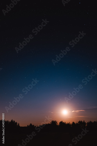 Landscape with Moon. Night sky with stars. Beautiful night sky photo taken in Ukraine during a clear night
