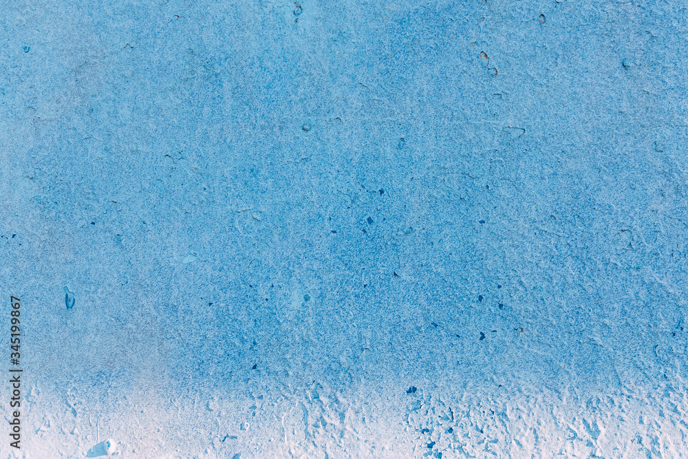 Grunge Blue painted on cement background and texture