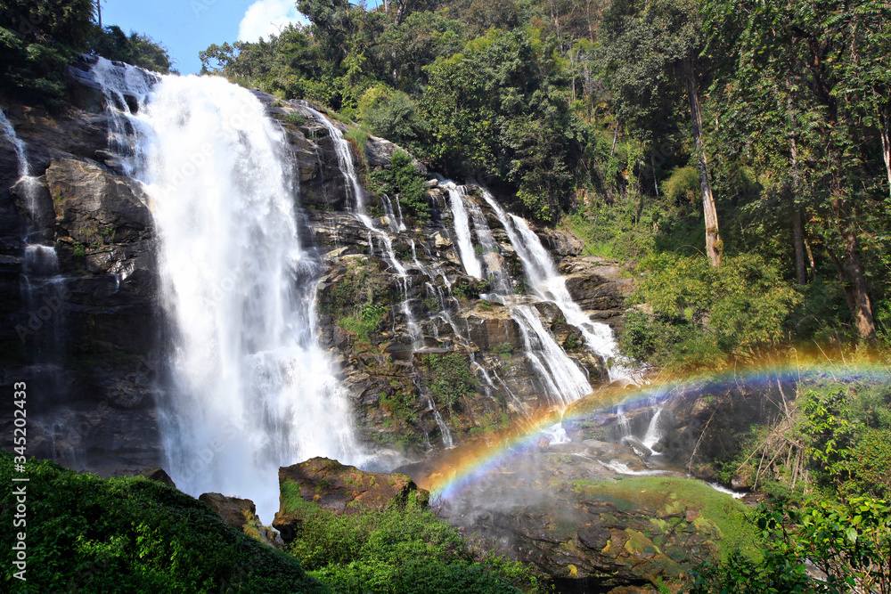 Fototapeta Scenic Wachirathan waterfall (Nam tok Vachirathan) and rainbow at Doi Inthanon national park, Chiang Mai, Thailand