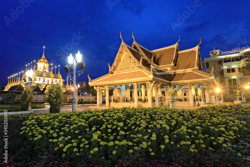 Wat Ratchanaddaram and Loha Prasat Metal Castle at twilight, Bangkok, Thailand