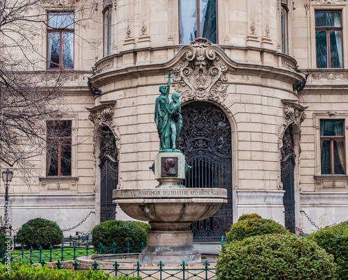 Fountain on the background the facade of Metropolitan Ervin Szabo Library in Budapest