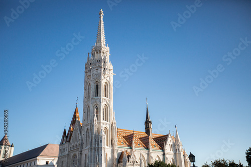 Budapest, Hungary - The famous Fisherman's Bastion at sunrise with statue of King Stephen I and Parliament of Hungary at background