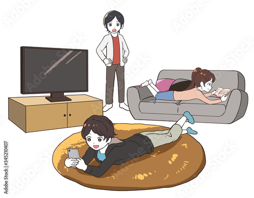 リビングでゴロゴロする子供を叱る母親