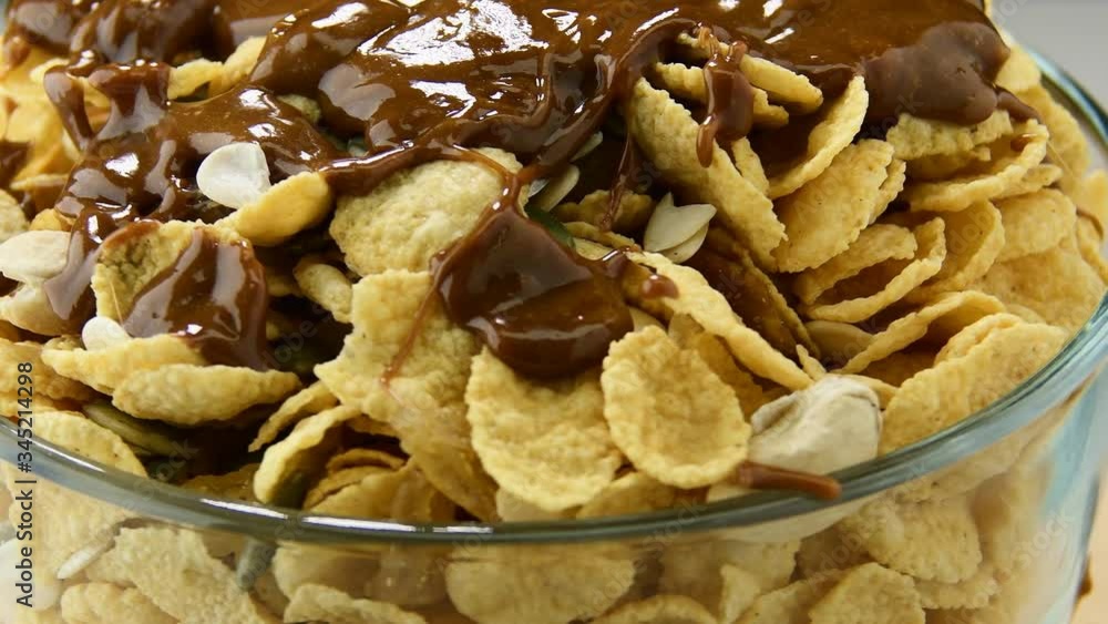 Corn flakes, or cornflakes, breakfast in bowl is rotates. Corn flakes, or cornflakes, breakfast in bowl is rotates.