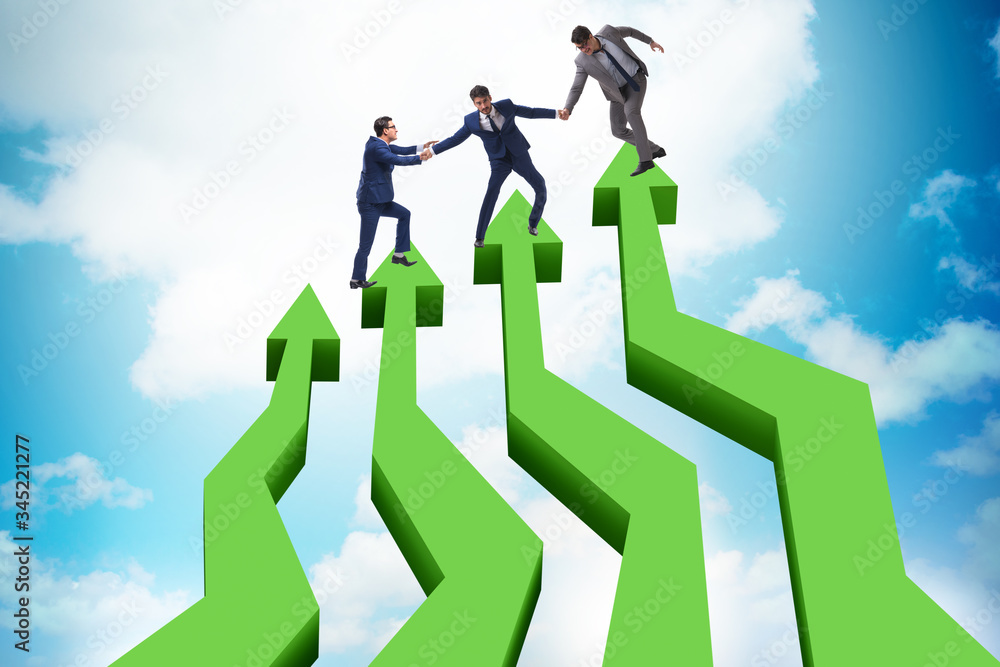 Colleagues helping each other to improve results Colleagues helping each other to improve results
