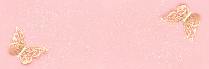 Two gold tracery shiny butterflies and sparkles glitter on pink pastel background. Festive background Banner Copy space Top view Template for your design