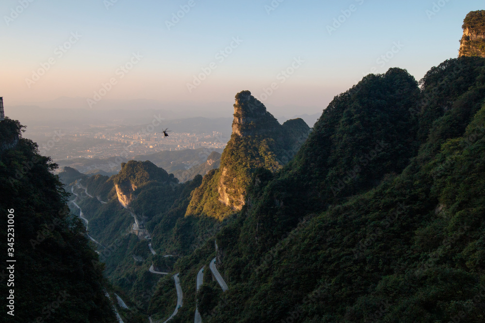Naklejka premium The scenery of Tianmen Mountain in Zhangjiajie, Hunan Province, China at sunset