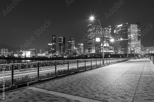 Skyline and street in downtown of Hong Kong city at night