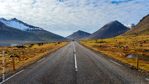 Car driving on beautiful road in Iceland.