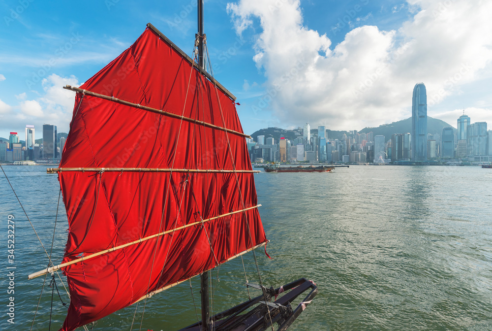 Sailing boat in Victoria Harbor of Hong Kong city Sailing boat in Victoria Harbor of Hong Kong city