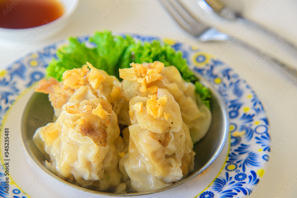 Traditional Chinese Korean DimSum, fresh Dumplings  with souce