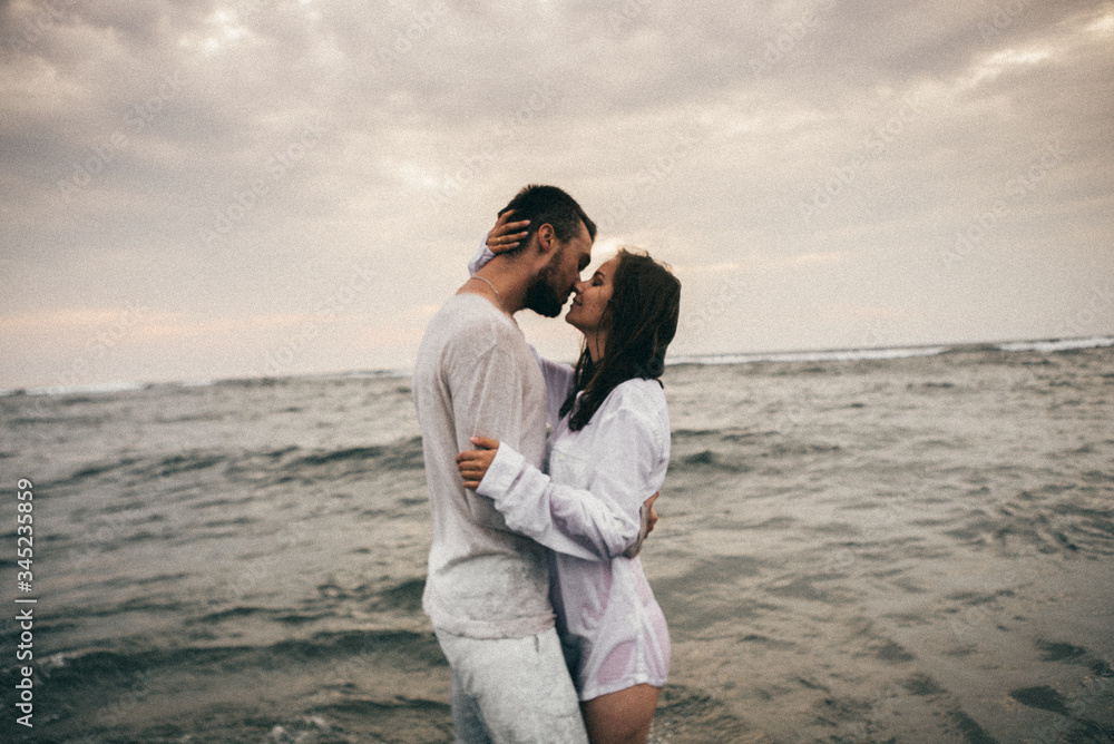 Happy lovers have a cheerful vibes on sea beach at sunset
Happy lovers have a cheerful vibes on sea beach at sunset