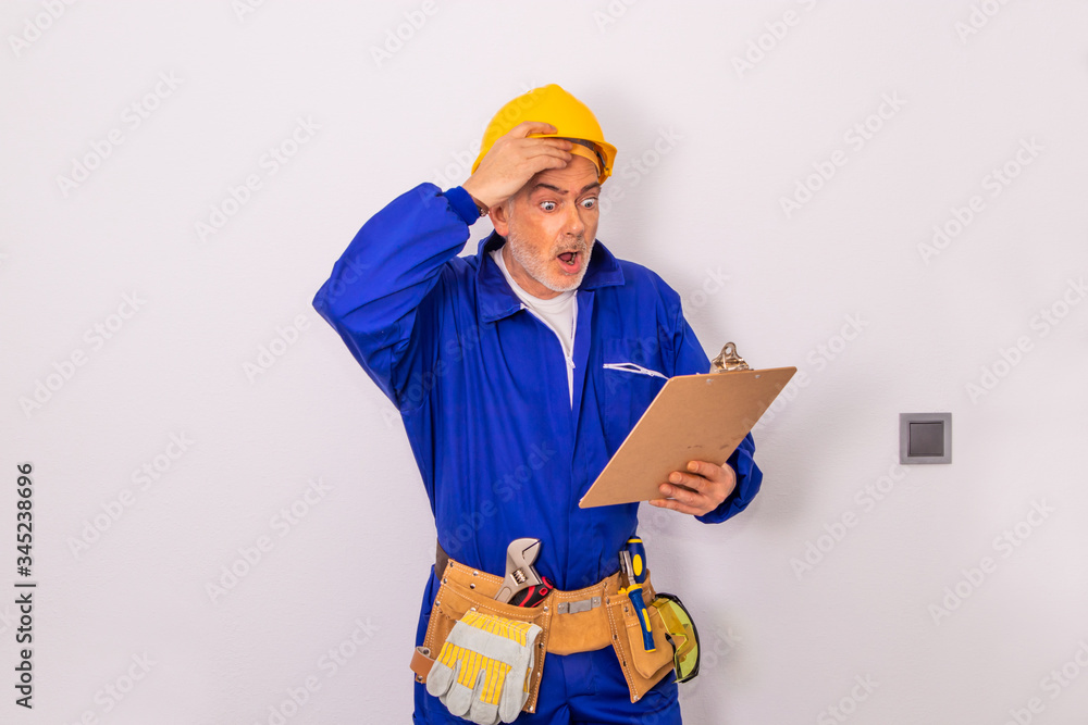 construction worker or professional man with tools and helmet construction worker or professional man with tools and helmet