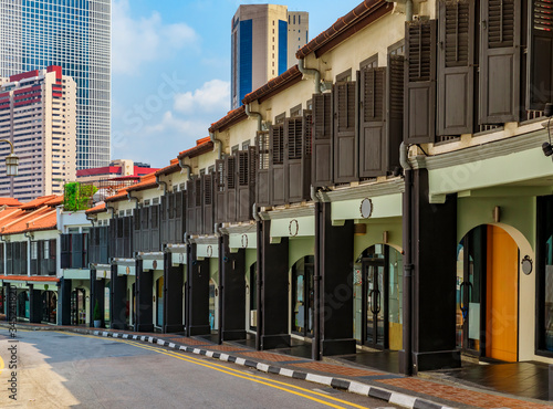 Photography Traditional archway arcade in a street in Singapore Chinatown with colonial shop