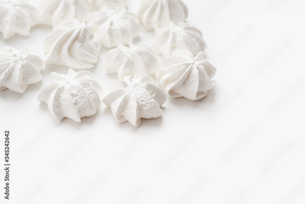 meringues, meringues on a white background, confectionery meringues, meringues on a white background, confectionery