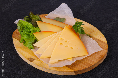 Sliced yellow Swiss cheese