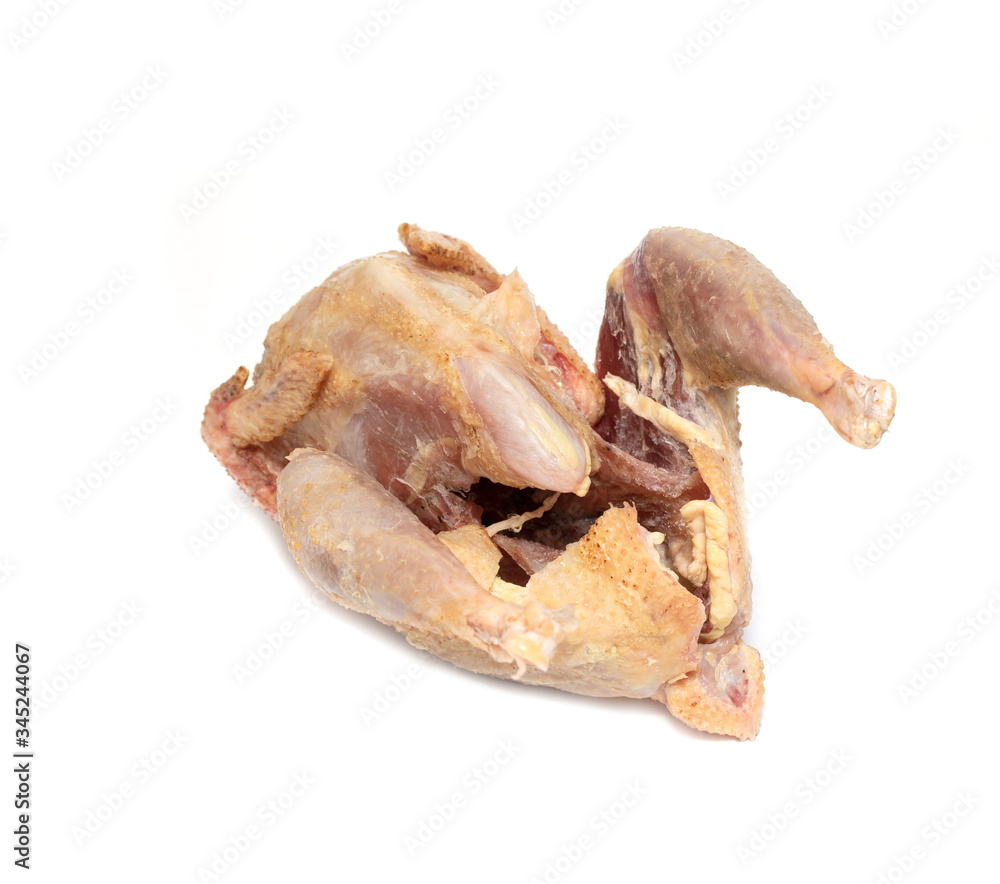 Raw chicken carcass isolated on a white background. Raw chicken carcass isolated on a white background.