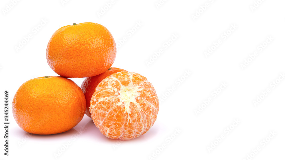 ripe tangerines on a white isolated background, close-up, a place for text ripe tangerines on a white isolated background, close-up, a place for text