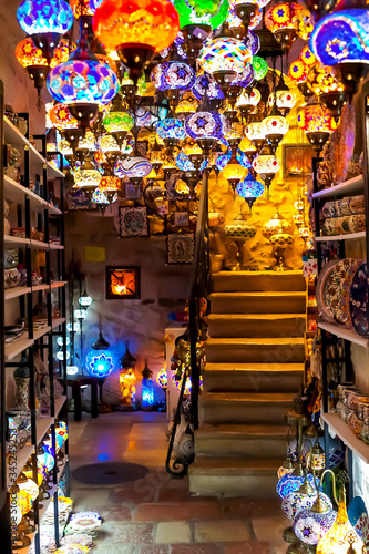 Gift shop with a variety of Turkish lamps for sale. The background is blurred, out of focus. Kotor