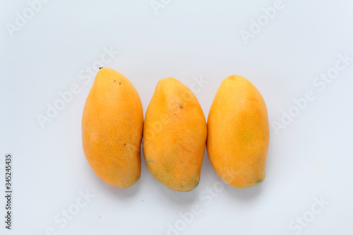Mangoes on a white background