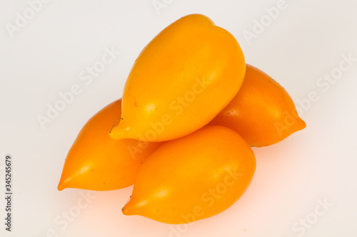 Ripe Yellow tomato isolated on white