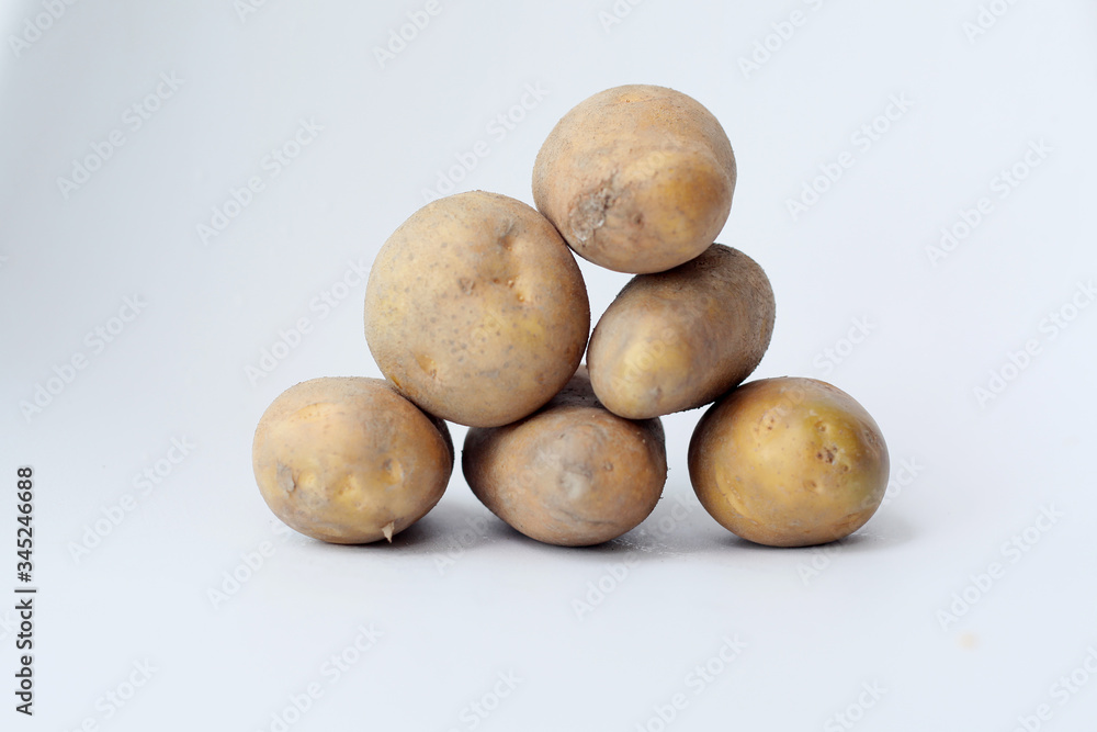 Fototapeta premium potatoes on a white background