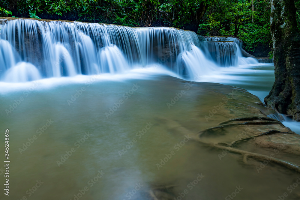 Fototapeta premium Beautiful deep forest waterfall in Thailand