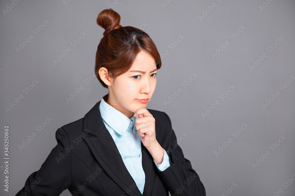 Close up portrait of pretty young business woman thinking Close up portrait of pretty young business woman thinking