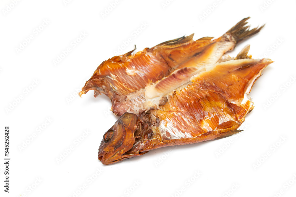 Smoked bream fish isolated on a white background. Smoked bream fish isolated on a white background.