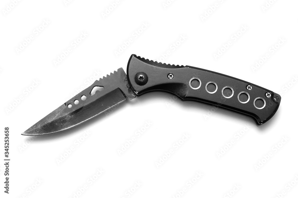 Metal black folding old knife on a white background. Metal black folding old knife on a white background.