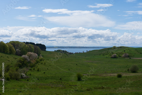 Beautiful spring landscape of nature reserve Hilleshogs dalar and the island of Ven at the horizon in Scania, Sweden.