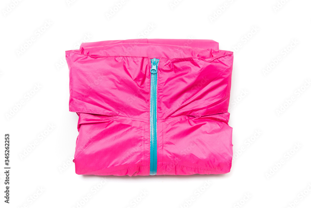 Folded pink zipper windbreaker jacket, rain proof jacket hoodie. Track jacket sport shiny nylon full zip isolated on white. Folded clothes.