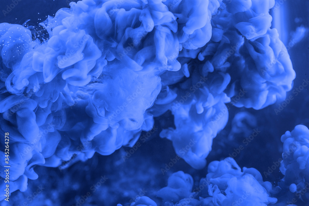 a blue ink texture at the black background