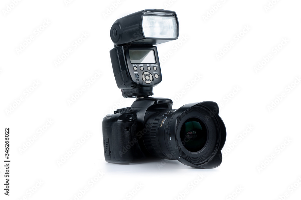 Photo camera and flash isolated on a white background. Copy space.