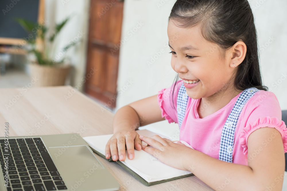 asian girl student online learning study online with video call teacher. social distance during quarantine, self-isolation, online education concept, homeschool, stay at home entertainment. asian girl student online learning study online with video call teacher. social distance during quarantine, self-isolation, online education concept, homeschool, stay at home entertainment.