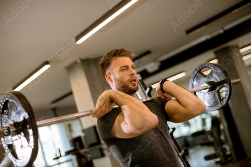 Young man working out with ...